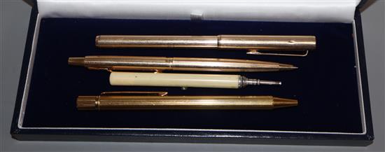 A gold plated Cartier rolled gold Dunhill and Parker Victorian ivory S Mordan and Co. pencil